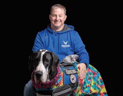 Paul Eden and his two-year-old service dog, Charlotte; a Great Dane from the Service Dog Project. Image courtesy of Paul Eden. Paul Eden and his two-year-old service dog, Charlotte; a Great Dane from the Service Dog Project. Image courtesy of Paul Eden.