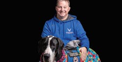Paul Eden and his two-year-old service dog, Charlotte; a Great Dane from the Service Dog Project. Image courtesy of Paul Eden. Paul Eden and his two-year-old service dog, Charlotte; a Great Dane from the Service Dog Project. Image courtesy of Paul Eden.
