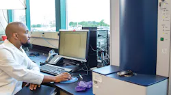Figure 1. Bacterial identification by MALDI-TOF. A laboratory technologist is analyzing clinical samples using a MALDI-TOF mass spectrometer. The bacterial protein profile spectrum for a sample is shown on the computer screen. The MALDI-TOF instrument is on the right (Photo courtesy of the Biomedical Laboratory Diagnostics Program at Michigan State University).