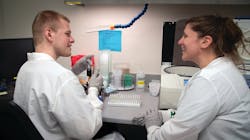 Courtney Mitra, MLS, works with student Keagan Courtney Mitra, MLS, works with student Keagan