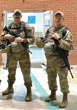 Air Force lab techs Senior Airman Jacob Washington (left) and Staff Sargeant Rily Venesky (right) stand in Hamid Karzai International Airport prior to departing Afghanistan Air Force lab techs Senior Airman Jacob Washington (left) and Staff Sargeant Rily Venesky (right) stand in Hamid Karzai International Airport prior to departing Afghanistan