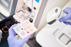 The cartridge contains not only a well for the sample, but also other reagents needed for the processing reactions. The cartridge contains not only a well for the sample, but also other reagents needed for the processing reactions.