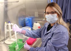 Erin Fernholz working in our molecular lab. Erin Fernholz working in our molecular lab.