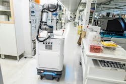 Figure 2: A robot works alongside humans in a semi-dark lab in a test conducted by Siemens Healthineers, United Robotics Group, and HUS Diagnostic Center. Figure 2: A robot works alongside humans in a semi-dark lab in a test conducted by Siemens Healthineers, United Robotics Group, and HUS Diagnostic Center.