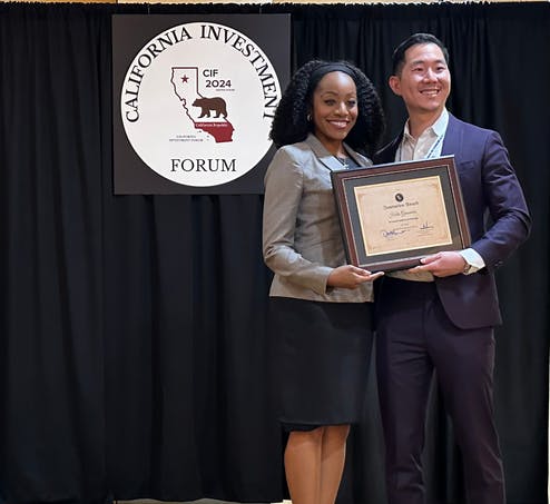 California State Controller, Malia Cohen (left) presents Helio Genomics CEO Justin Chen Li (right) with the CIF 2024 Innovation Award for AI Based Medical Technology.