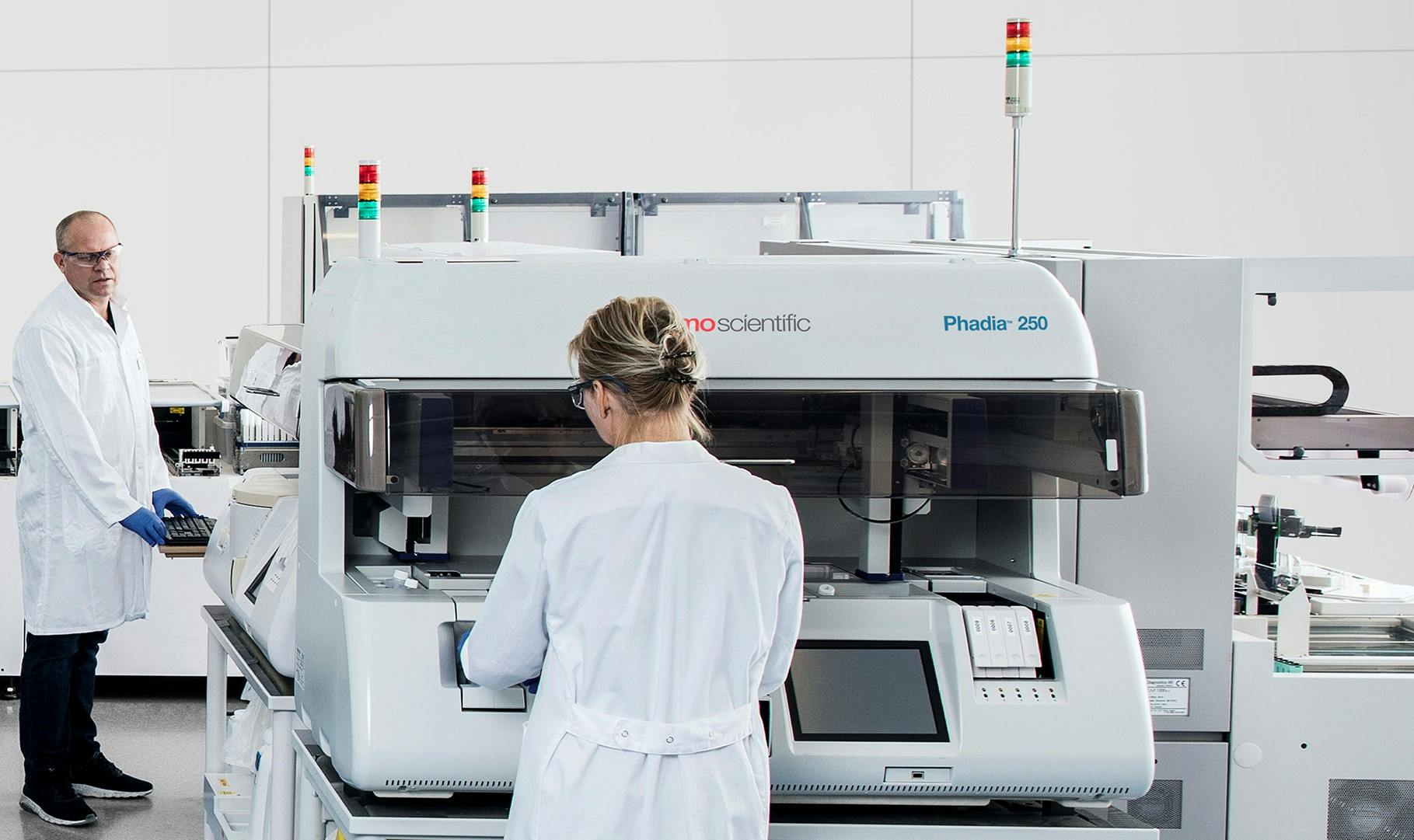 6712611609efb1a016071795 Systems Image Phadia 250 With Family