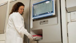 67ed45f5706101901d51e2eb 02 Lab Tech Puttingtrayinsystem3 67ed45f5706101901d51e2eb 02 Lab Tech Puttingtrayinsystem3